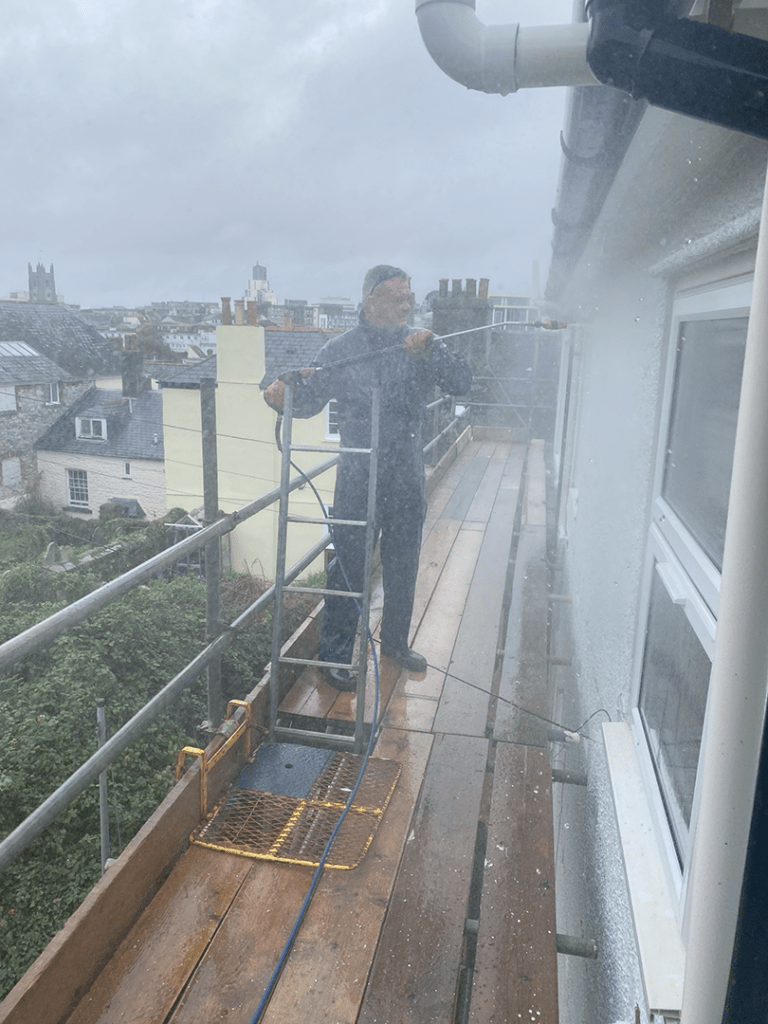 Cleaning Upvc Windows With Pressure Washer On Scaffolding